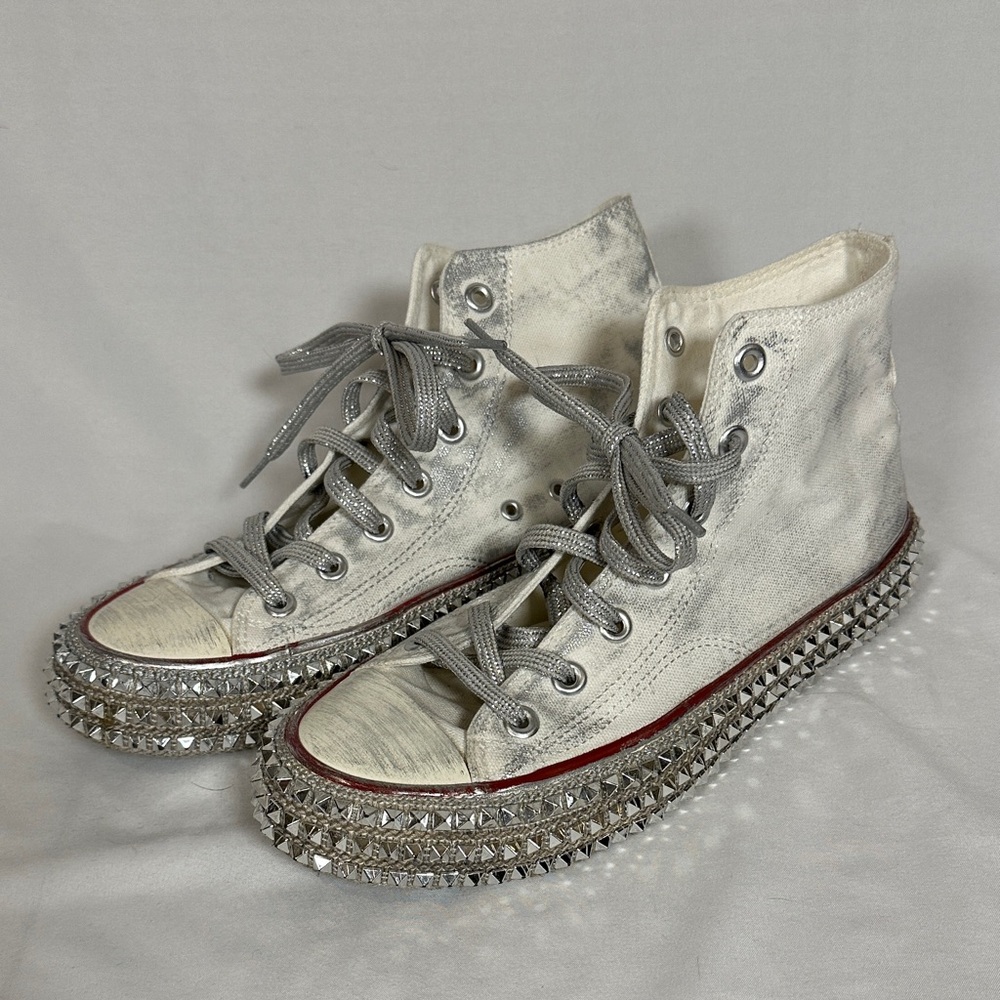 Stylish Silver High-Top Sneakers with Studded Soles